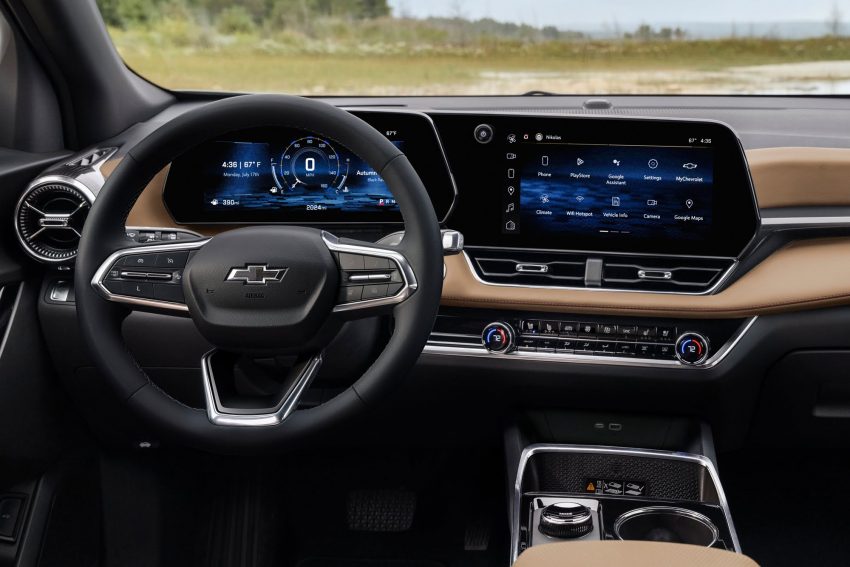 2025 chevrolet equinox activ press photos interior 003 cockpit dash steering wheel digital instrument cluster central multimedia screen 850x567